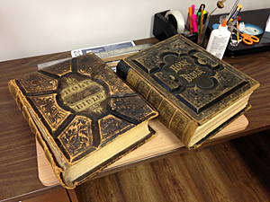 Bible to be repaired on the left, repaired bible on the right